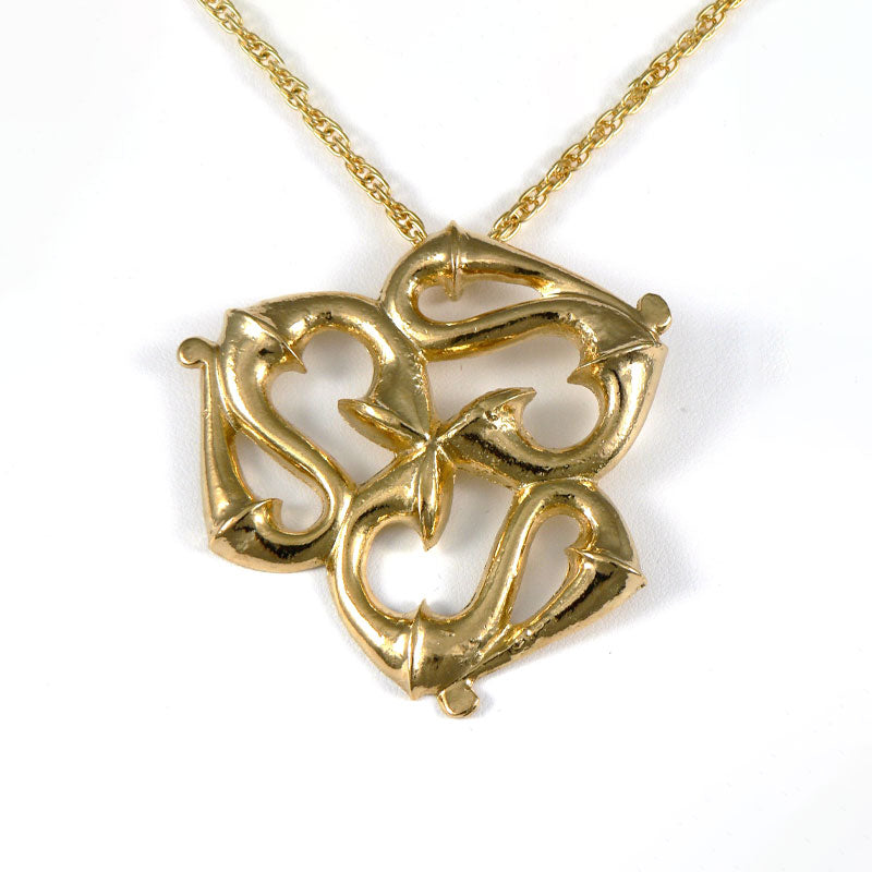 Romano British gold necklace with a intricate pendant on a white background