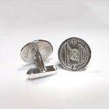 Silver King Alfred coin cufflinks on a white background