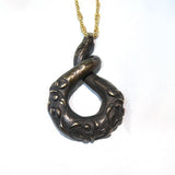 Solid bronze heavy twist Torc Terminal pendant
